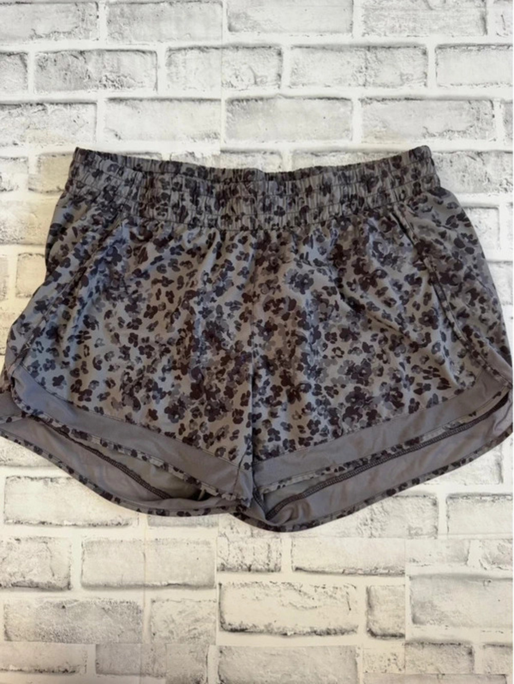 Women’s Athleta gray and black animal print lined shorts Large